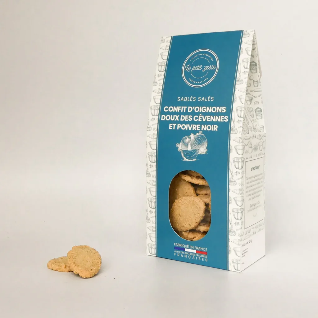 le petit zeste sables confit d'oignons doux des cevennes aop et poivre noir